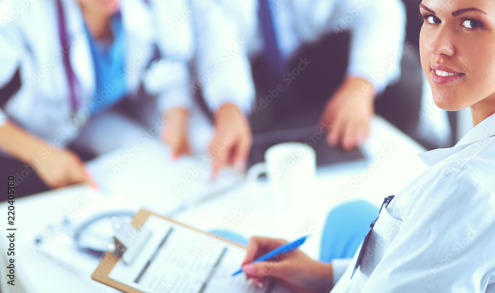 Happy medical team discussing and working together Happy medical team discussing and working together