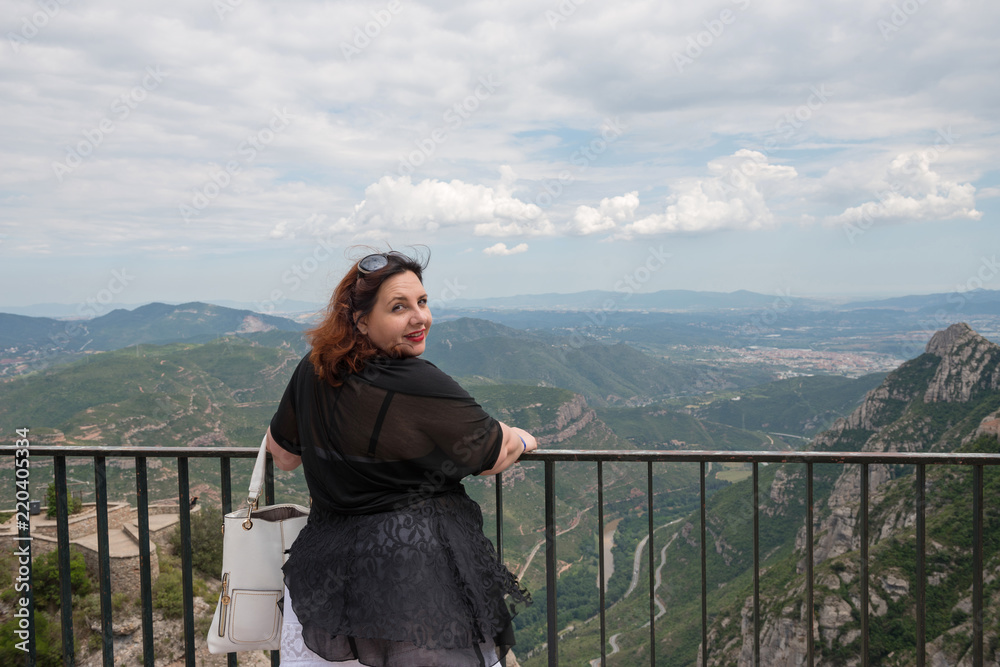 Woman on Llobregat valley background, Montserrat, Catalonia, Spain.