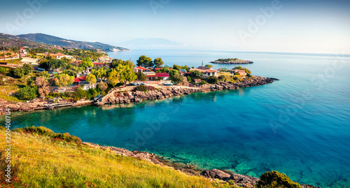 Small bay on the Zakynthos island. Sunny spring seascape of the Ionian Sea, Mikro Nisi village location, Greece, Europe. Traveling concept background. Artistic style post processed photo.