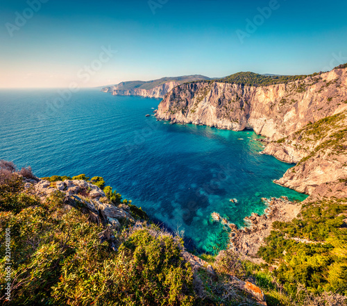Aerial spring view of high cliffs on the Ionian Sea. Sunny morning seascape of Zakynthos (Zante) island, Greece, Europe. Beauty of nature concept background.
