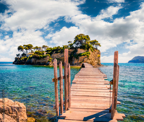 Bright spring view of the Cameo Island. Picturesque morning scene on the Port Sostis, Zakinthos island, Greece, Europe. Beauty of nature concept background. photo