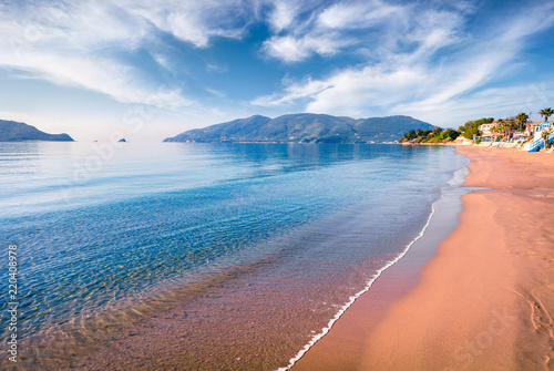 Peaceful morning view of beach of Zakynthos (Zante) island. Sunny spring seascape of the Ionian Sea, Greece, Europe. Beauty of nature concept background.