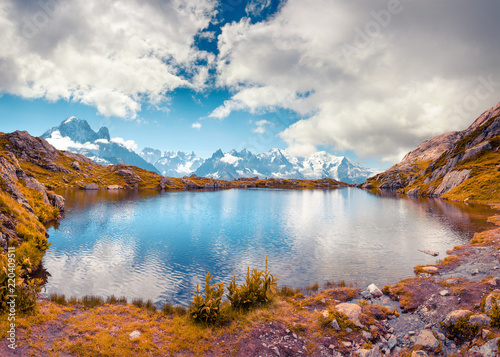 Colorful autumn view of the Lac Blanc lake with Mont Blanc (Monte Bianco) on background, Chamonix location. Beautiful outdoor scene in Vallon de Berard Nature Preserve, Graian Alps, France, Europe.