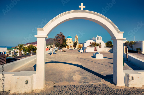 Beautiful morning view of Santorini island. Picturesque spring scene of the Saint George Church, Oia, Greece, Europe. Traveling concept background. photo