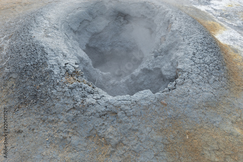 hverir geothermal area in iceland, active mud pod with steam photo