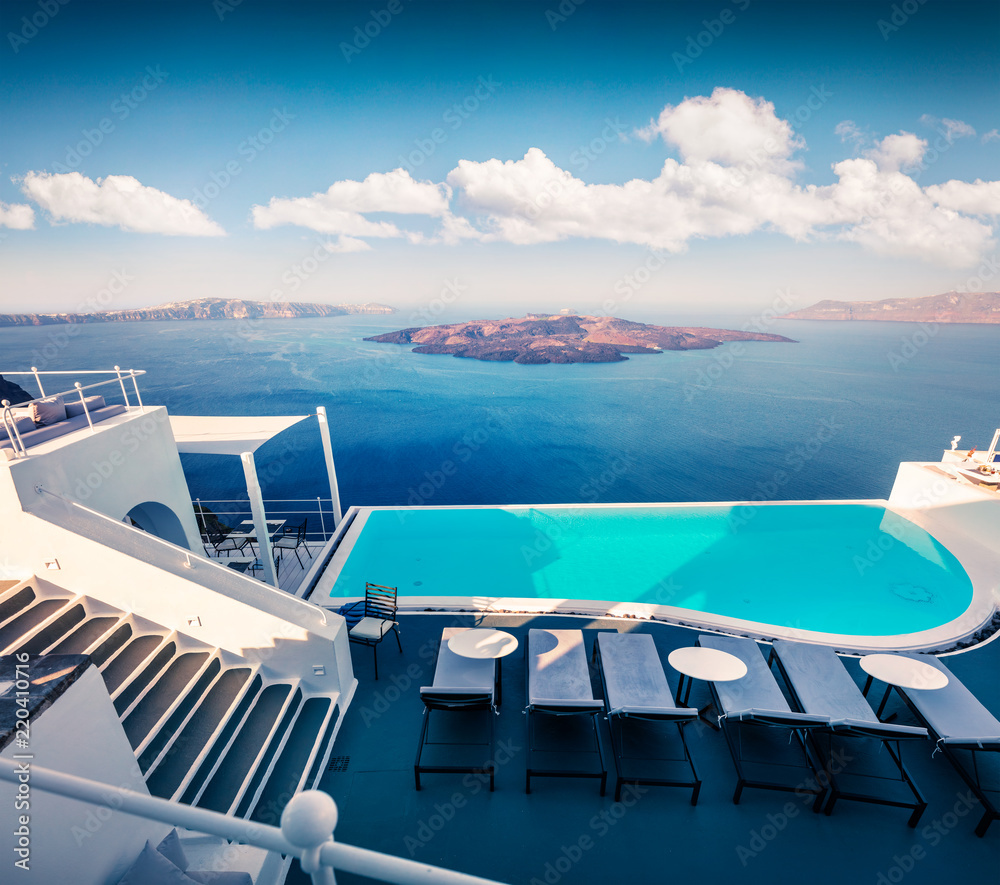 Sunny morning view of Santorini island. Picturesque spring scene of the famous Greek resort Thira, Greece, Europe. Traveling concept background.