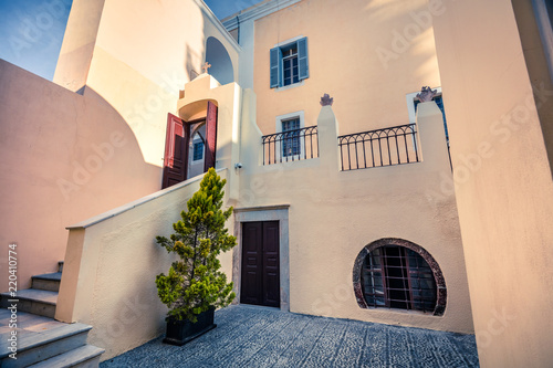 Courtyard of the St. Gerasimos Christian Church in famous Grrek resort Fira, Santorini island, Greece, Europe. photo