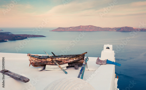 Misty morning view of Santorini island. Picturesque spring scene of the famous Greek resort Thira, Greece, Europe. Traveling concept background.
