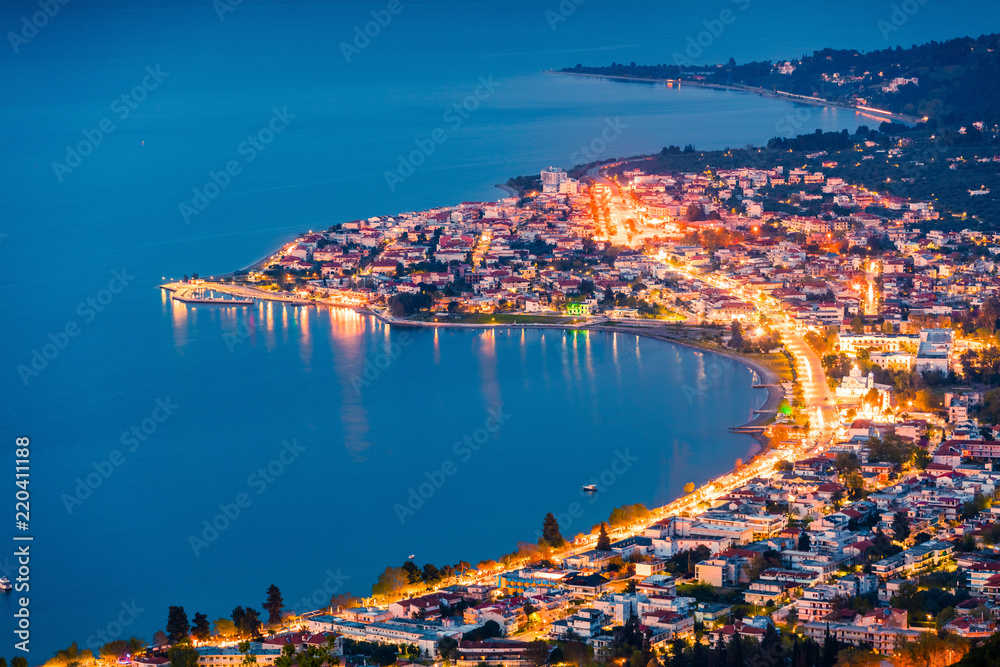 View from the bird's-eye of Kamena Vourla town in the evening light. Colorful spring cityscape in Greece, Europe. Beautiful sunset on Aegean Sea. Artistic style post processed photo.