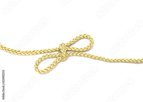 close up of gold rope on white background