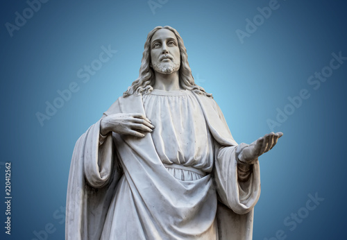 a statue of jesus with open hands