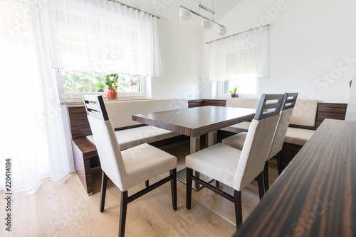 dining room modern furniture with white material and zebrano wood © chrislhasl
