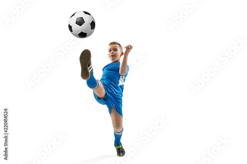 Fototapeta Naklejka Na Ścianę i Meble -  Young boy with soccer ball doing flying kick, isolated on white. football soccer players in motion on studio background. Fit jumping boy in action, jump, movement at game.