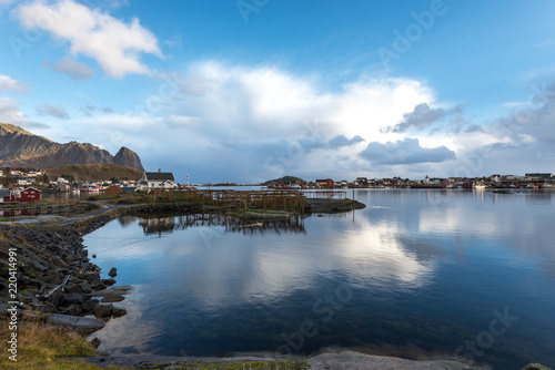 norwegian old city Reine with reflections in water and cloudy sky, norway, europe, lofots, lofoten, rorbuer