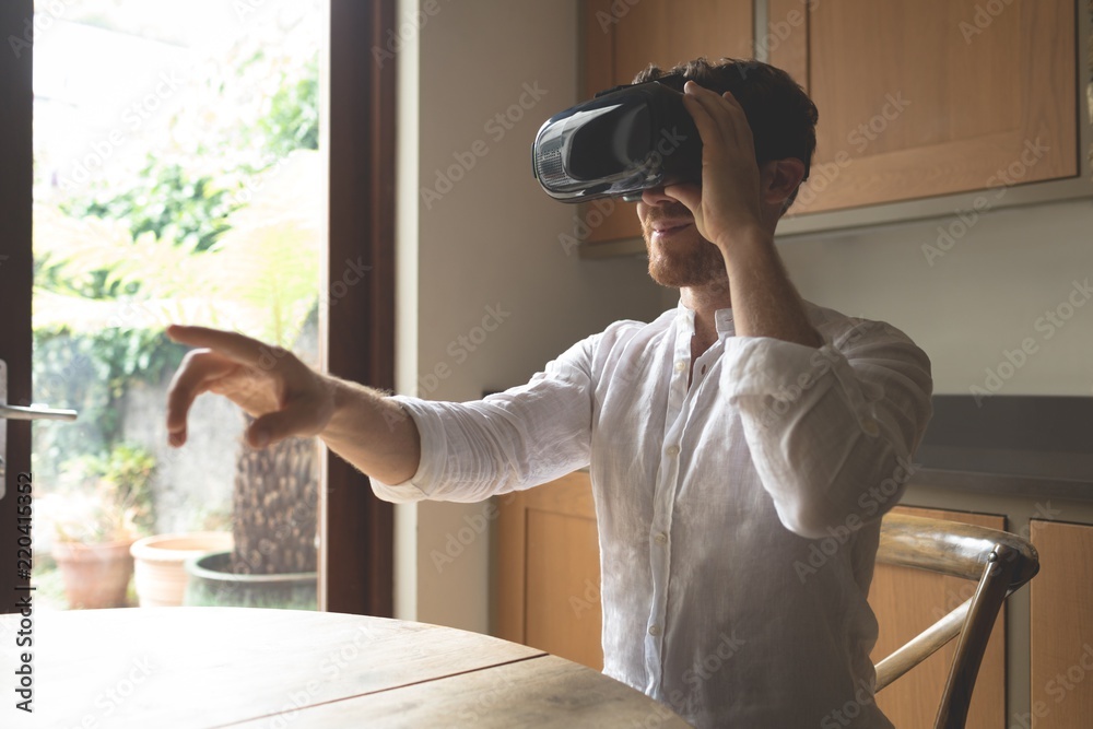 Man using virtual reality headset Man using virtual reality headset