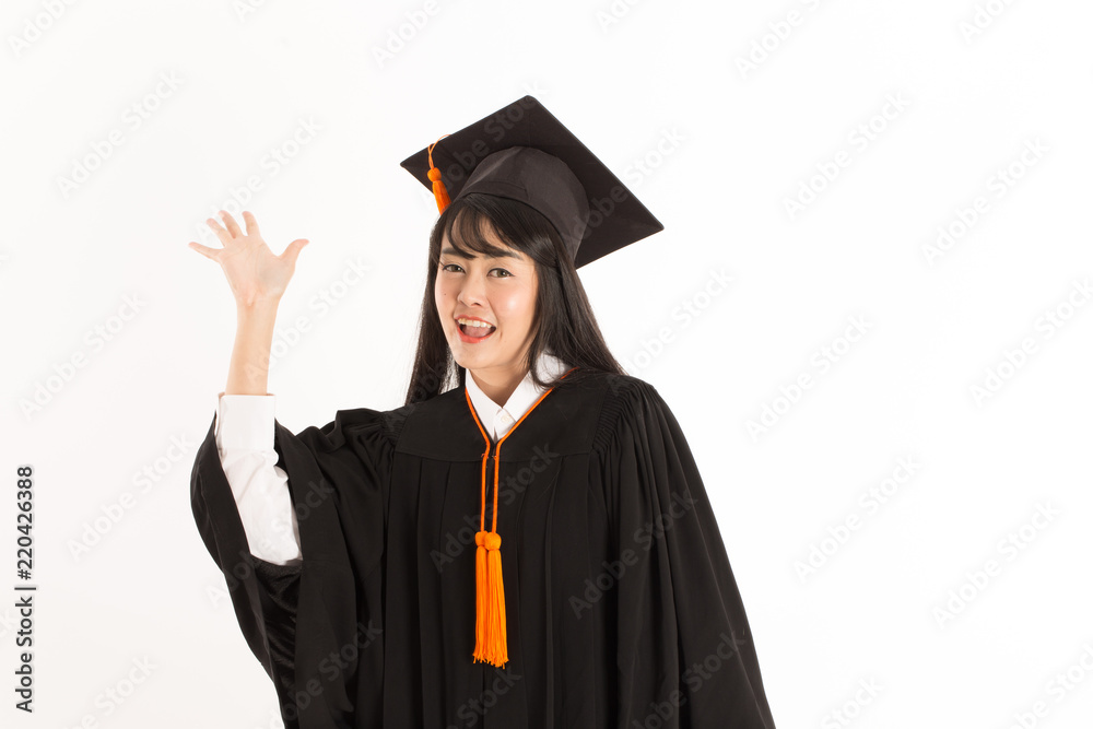 Beautiful Attractive Asian Graduated woman in cap and gown smile and celebrating,Education Success Concept,Isolate on white background Beautiful Attractive Asian Graduated woman in cap and gown smile and celebrating,Education Success Concept,Isolate on white background