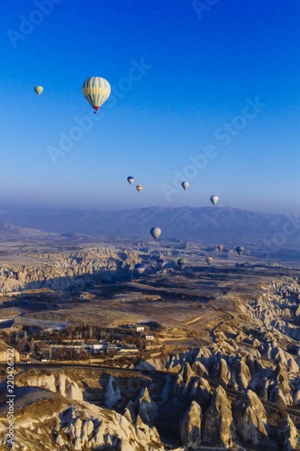 View of Hot Air Balloon over Landscape in Cappadocia, Turkey