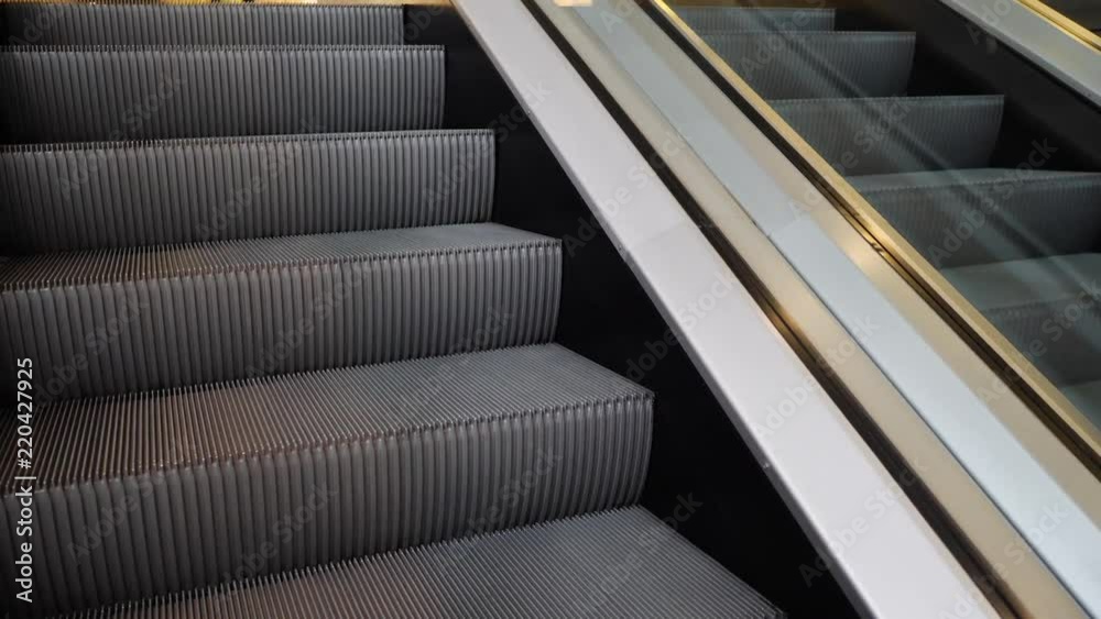 escalator staircase moving up on the floor modern building escalator staircase moving up on the floor modern building