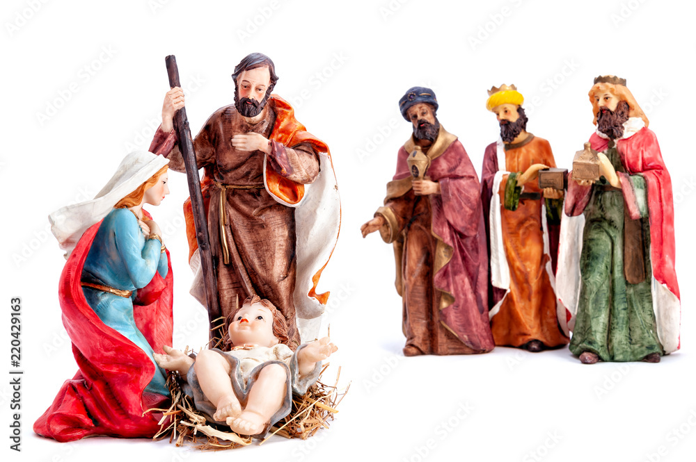 Christmas nativity scene with the Holy Family and the three wise men, isolated on white background