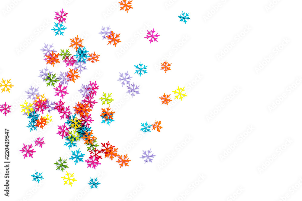 .Placer of a set of colored snowflakes on an isolated background. Copy space