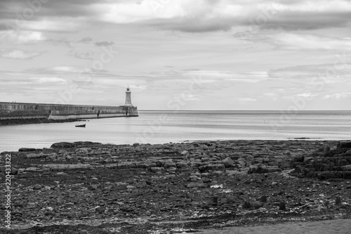 Beautiful landscape around Tynemouth Pier and lighhouse in monochrome