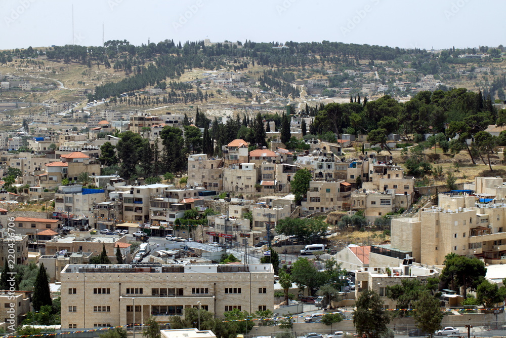 view of the old city of Jerusalem in Israel with an olive mountain.