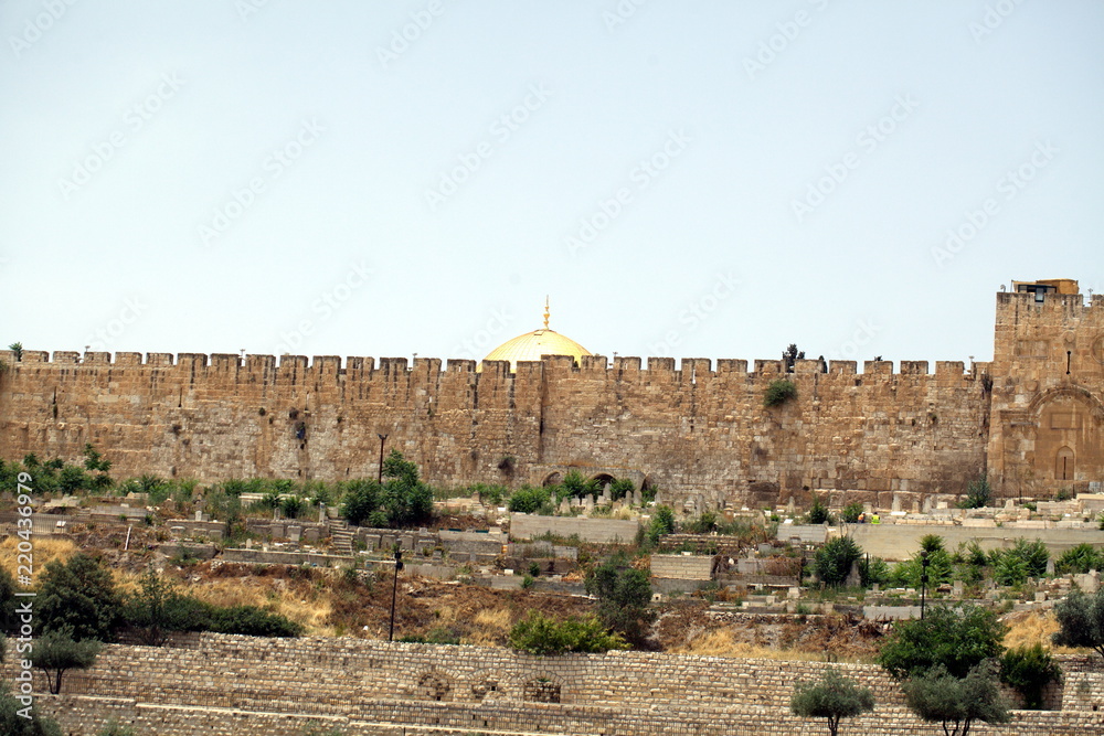 The fortress wall of the old city of Jerusalem in Israel. Palestinian Arab settlements