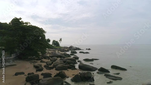 A drone shot of giant boulders at Shamrock Beach at Penang, Malaysia. photo