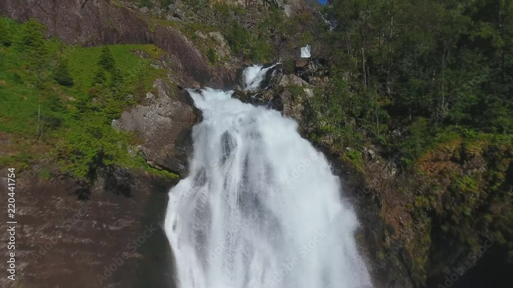 Aerial view of Waterfall Latefossen at sunset lights in summer in Norway Aerial view of Waterfall Latefossen at sunset lights in summer in Norway