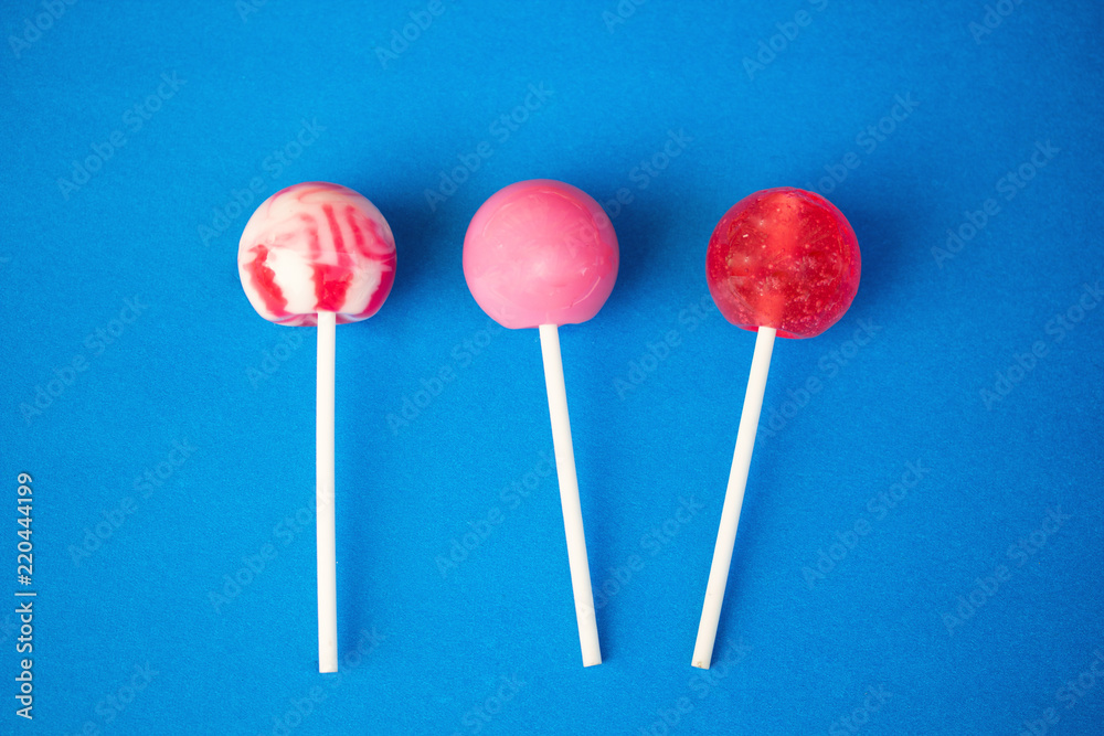 lollipops on a bright blue background