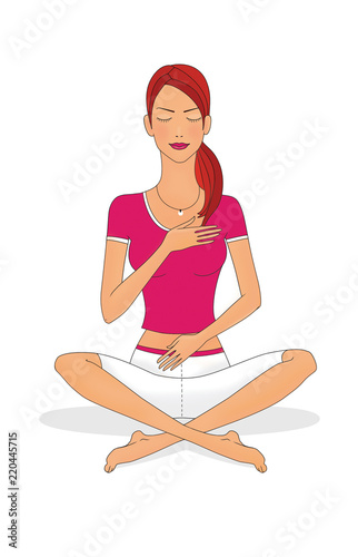 A girl with closed eyes sits cross-legged and with her hands on her chest and stomach. Isolated on white background