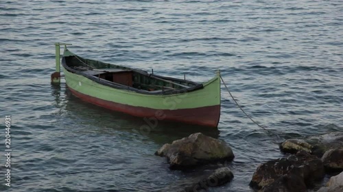 Wallpaper Mural a single fishing boat on the shore Torontodigital.ca