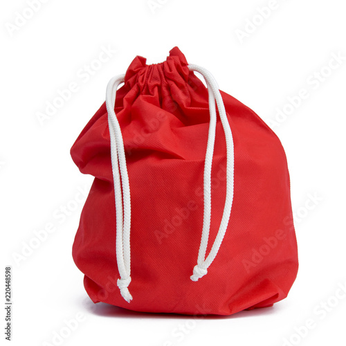 .Red bag with gifts on white isolated background.