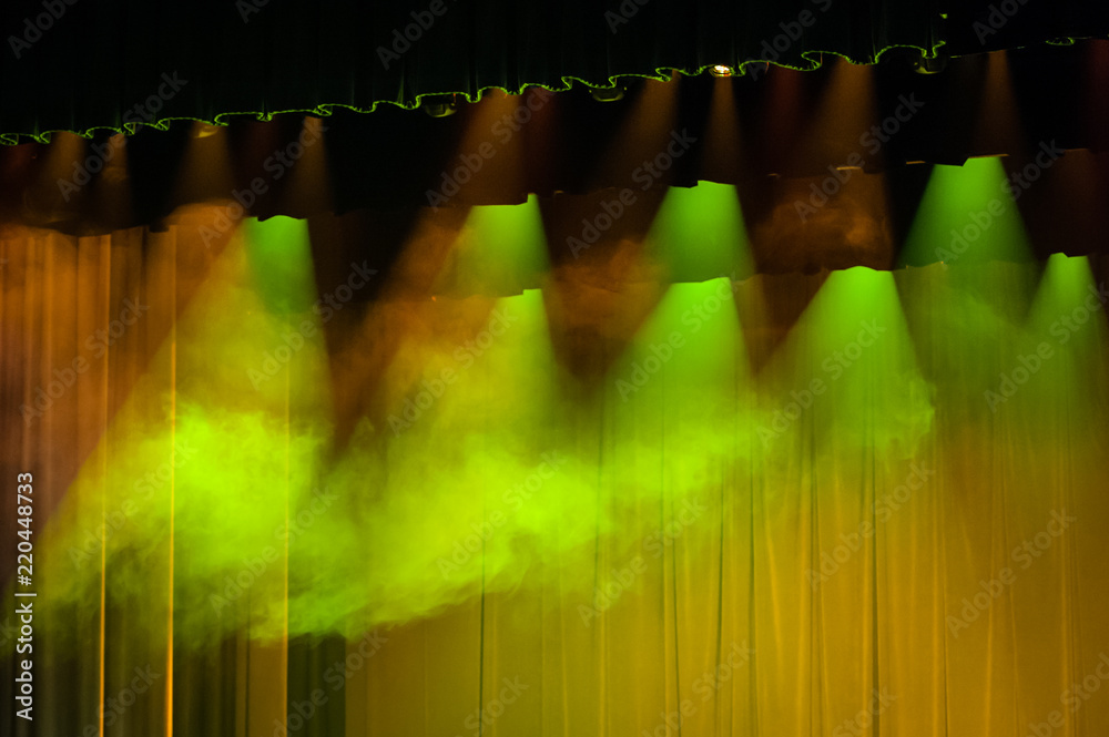 Stage background with lights. Soft focus. Illuminated concert stage