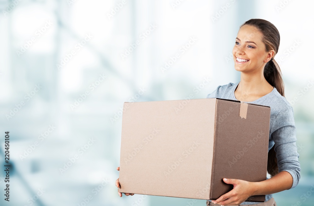 Woman moving into new house isolated on white