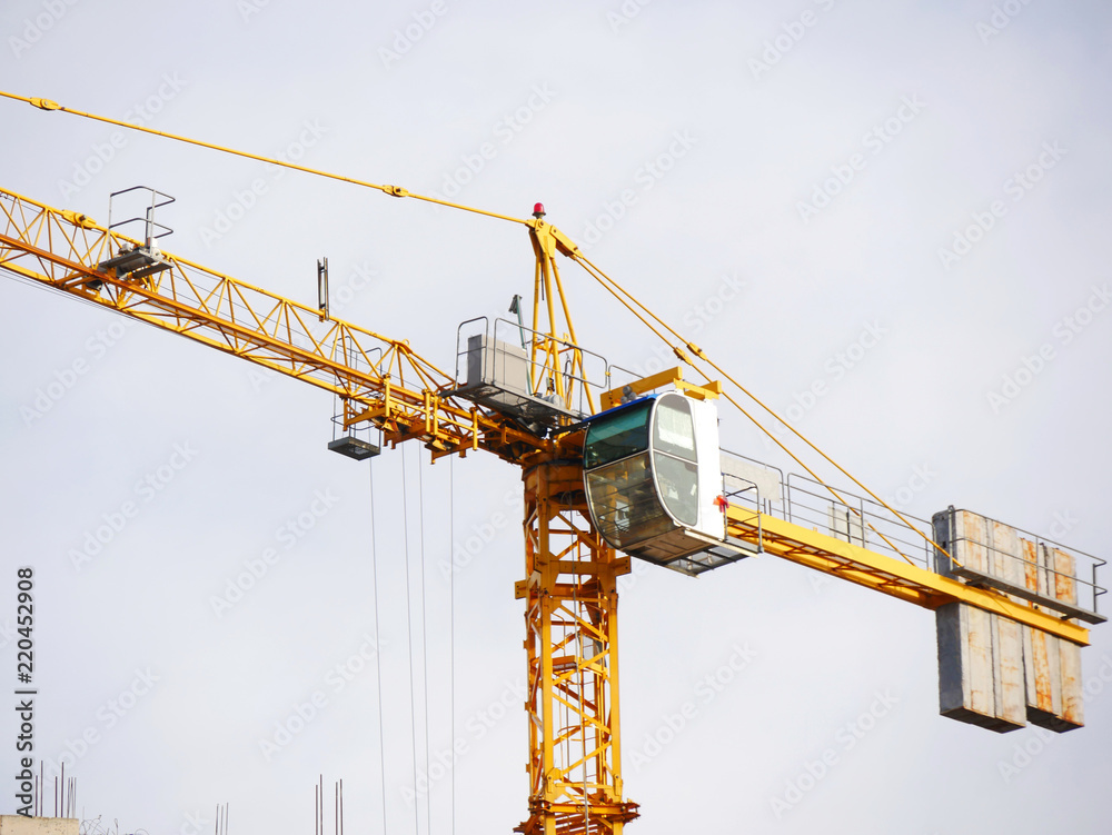 Crane. Huge crane near building. Construction site. Crane. Huge crane near building. Construction site.