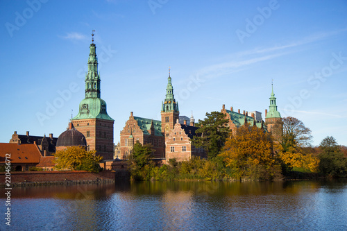 Frederiksborg castle in Hillerod, Denmark © Tomtsya
