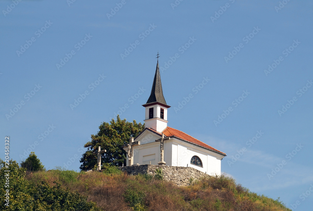 A tiny Catholic chapel on a hill in the village of Esztergom in Hungary. A tiny Catholic chapel on a hill in the village of Esztergom in Hungary.