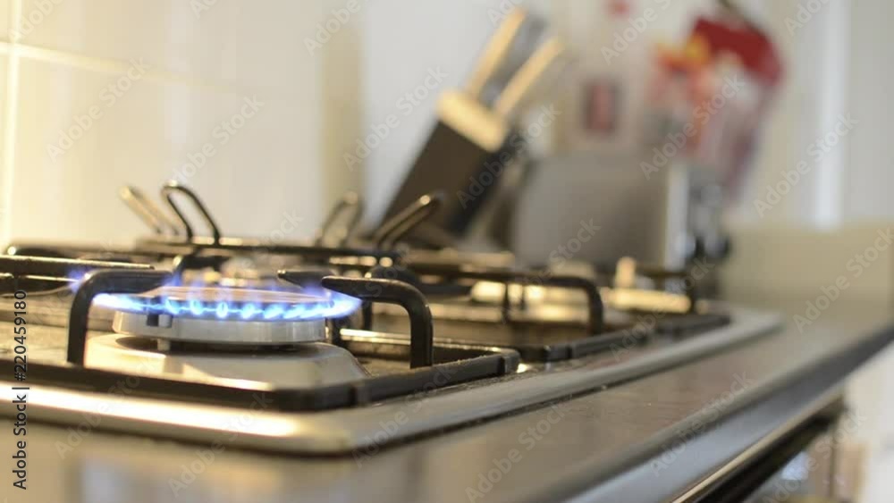 Lighting a stove top, second angle. Lighting a stove top, second angle.