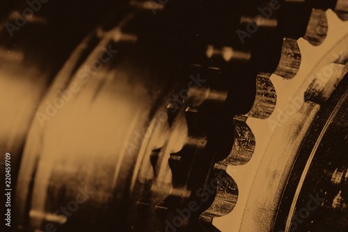 Wallpaper Mural Monochrome background image of gear close up. Artwork from auto part in macro photography. Sepia tones. Torontodigital.ca