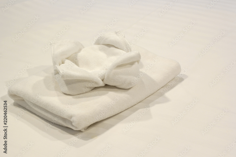 white towels on bed