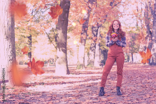 young red head woman in nature