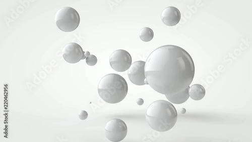 3D animation of many white balls moving in space.