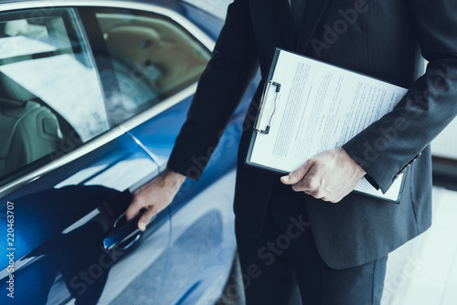 Close-up Of Male Hand Opening Blue Cars Door