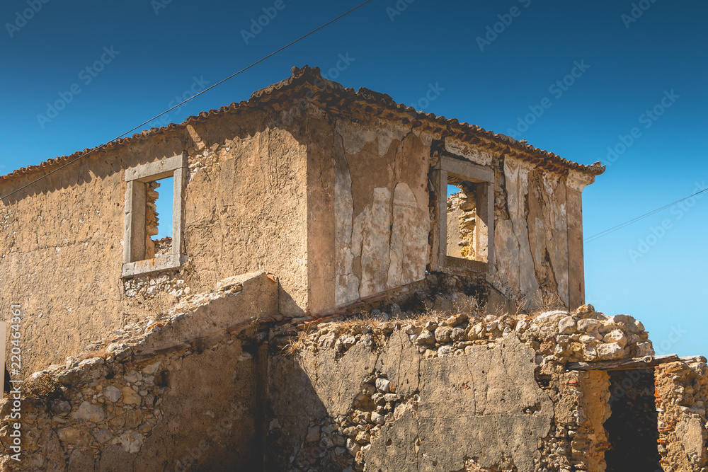 architectural detail of an old house in ruins on the seaside