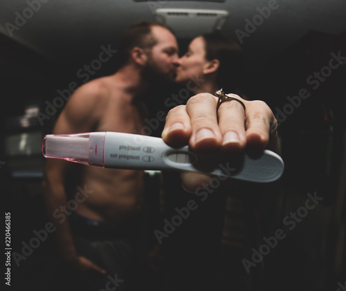 Young couple finding out that they're having a baby.
