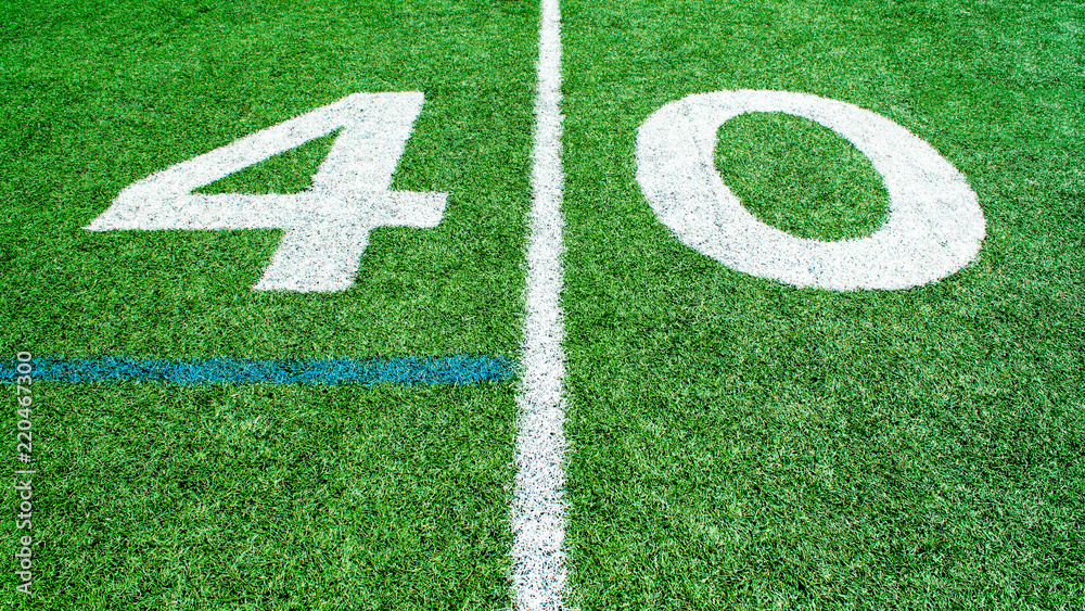 numbers marking the 40 yard line on an American football field numbers marking the 40 yard line on an American football field