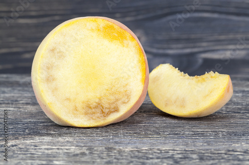 cut ripe peach photo