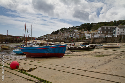 Mousehole harbor at low tide