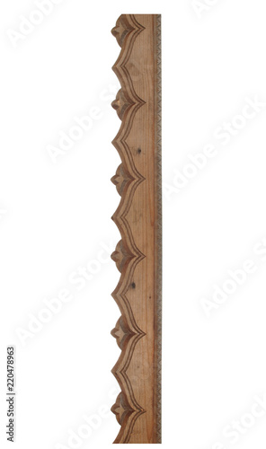 Old wooden carved platband isolated on white background. photo